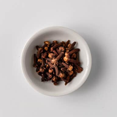 cloves in small white bowl