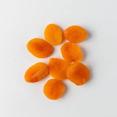 dried apricots on white table top