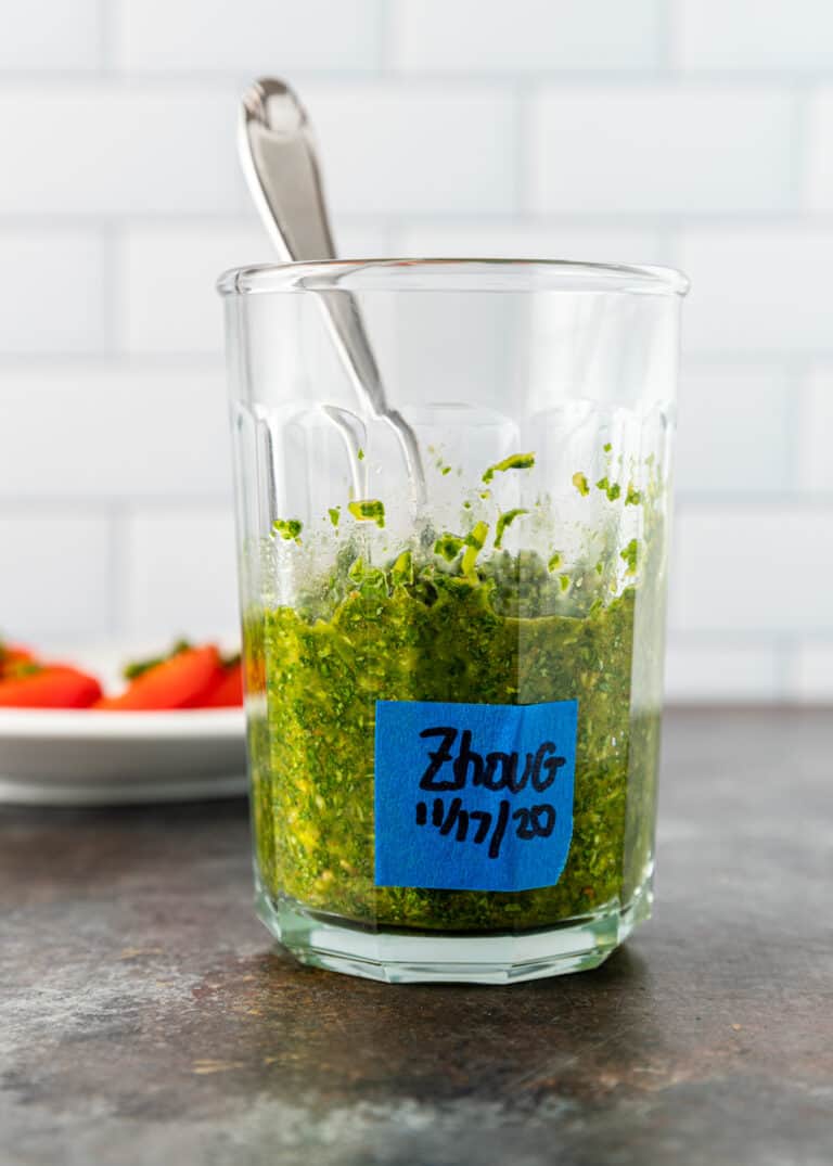 zhoug sauce in glass jar