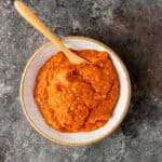 ajvar relish in bowl with serving spoon