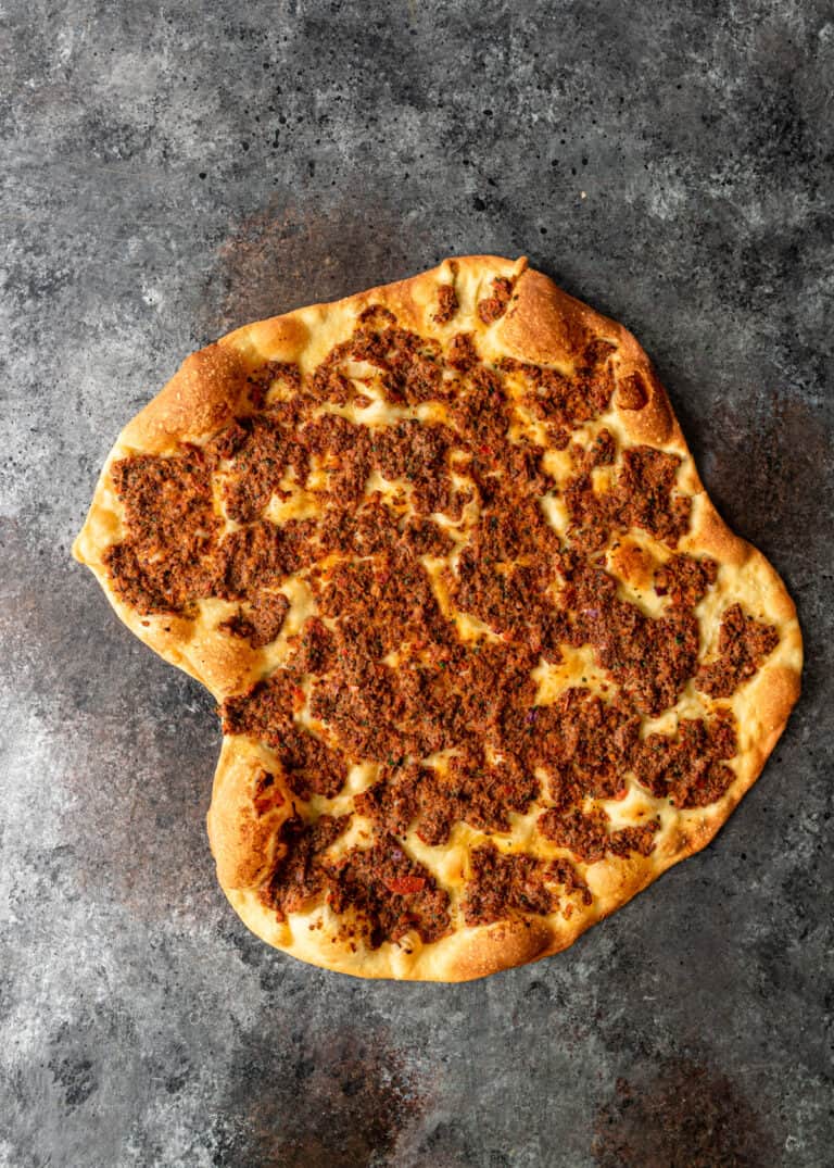 overhead: homemade Turkish pizza with crispy, golden crust