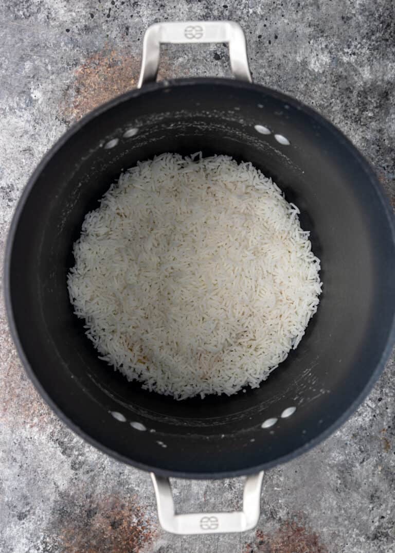 overhead: Jasmine rice in large pot for lubia polo