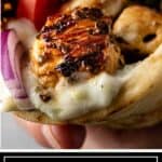 titled image for Pinterest shows closeup of a souvlaki pita sandwich