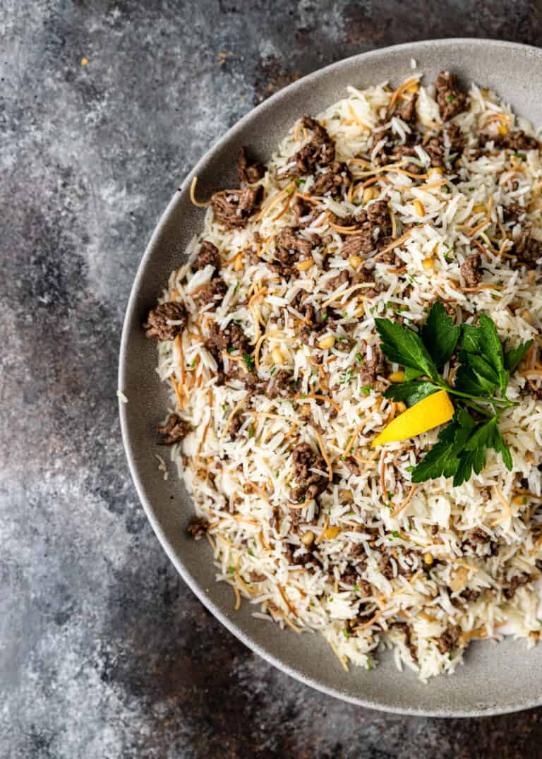 overhead image: plate of hashweh (Lebanese rice with vermicelli and minced beef)