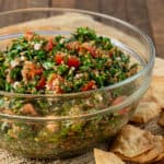 glass salad bowl filled with tabbouleh