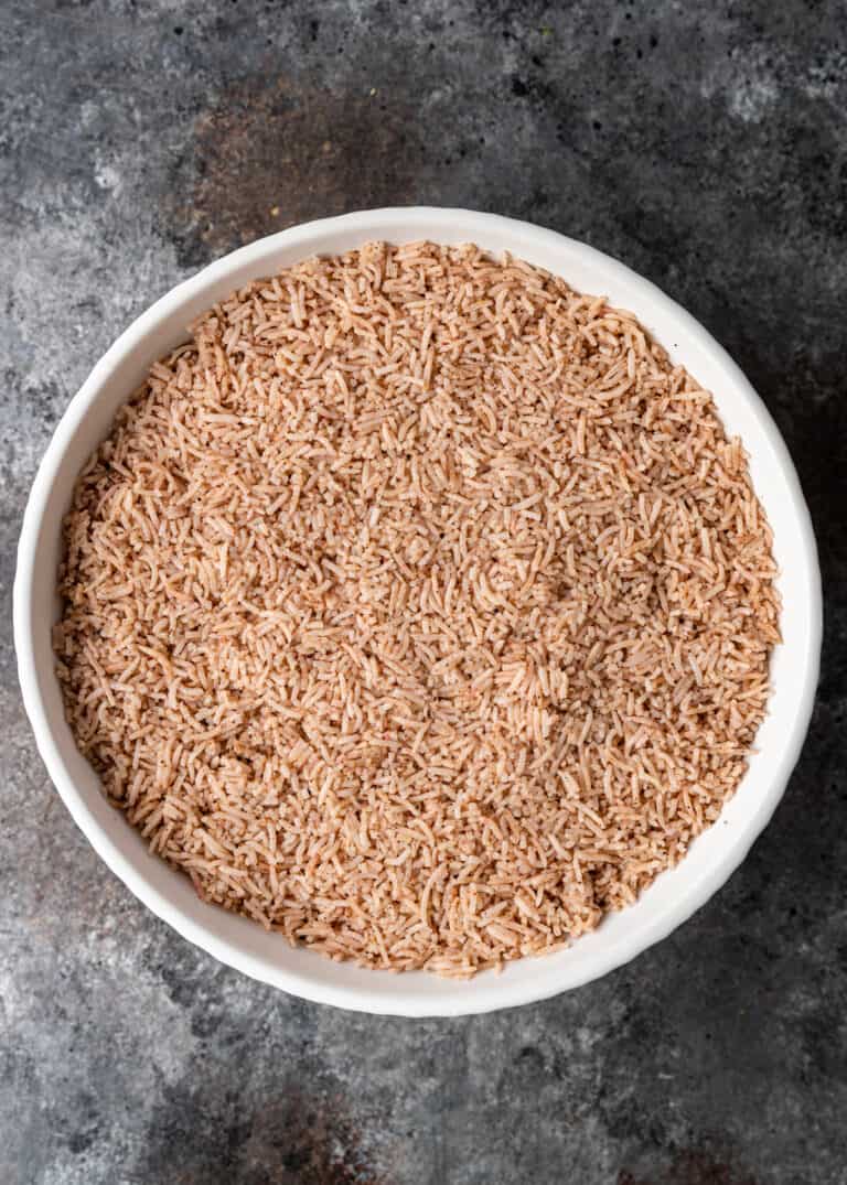 overhead: raw basmati rice in white bowl
