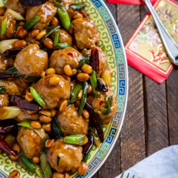 kung pao Asian chicken meatballs on Oriental style platter