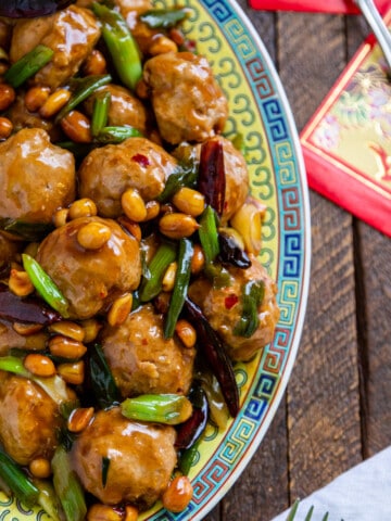 kung pao Asian chicken meatballs on Oriental style platter