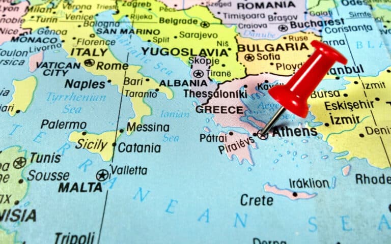 red pin marks Athens on map of Greece