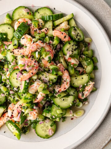 plate of japanese sunomono salad with cucumbers and shrimp