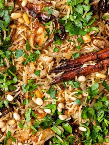 close up of herbs and spices in baked basmati rice