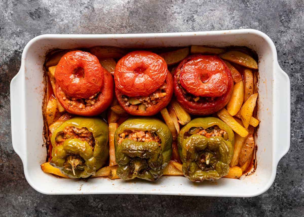 overhead image of gemista (greek stuffed peppers and tomatoes)