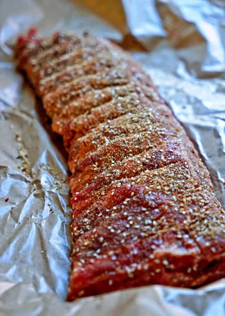 rack of pork ribs with dry rub seasoning