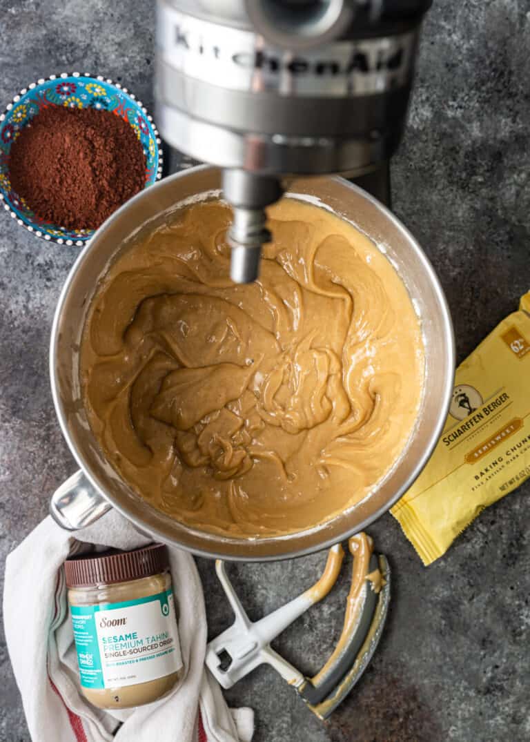 overhead: making tahini brownie recipe in stand mixer
