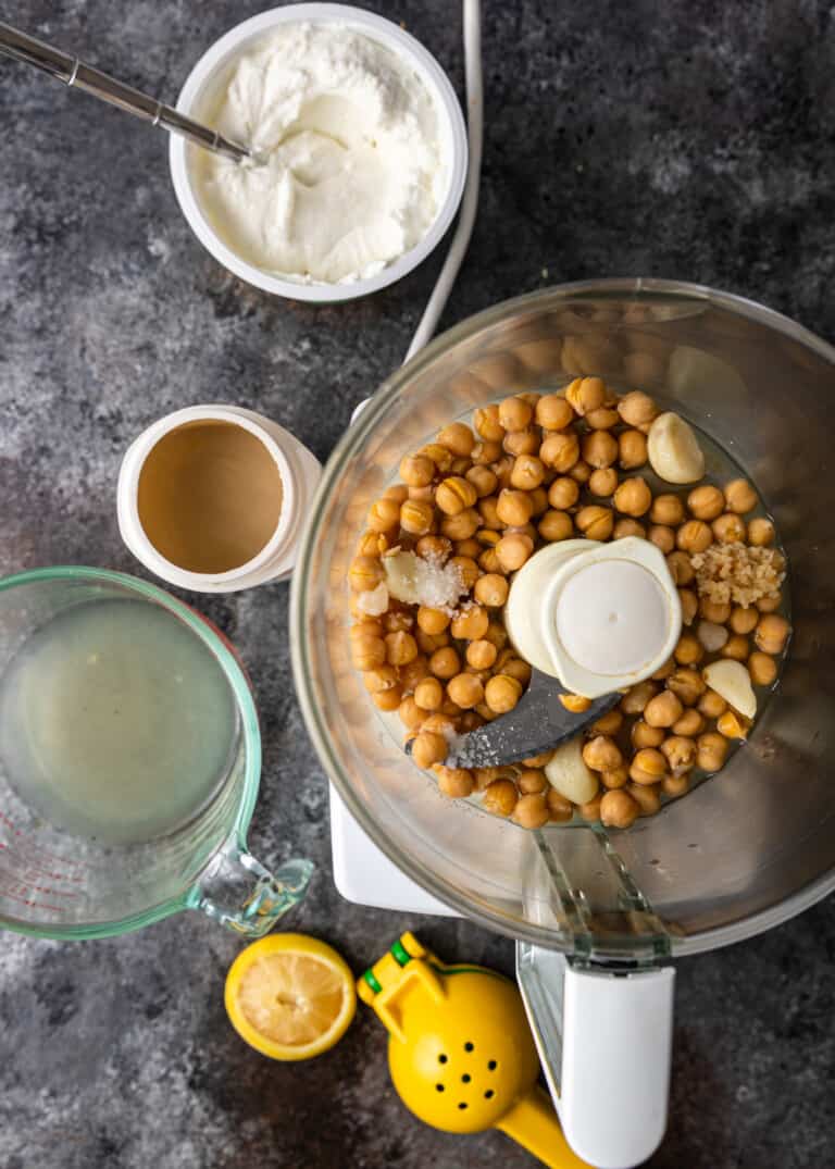 overhead: chickpeas in food processor bowl for fatteh recipe