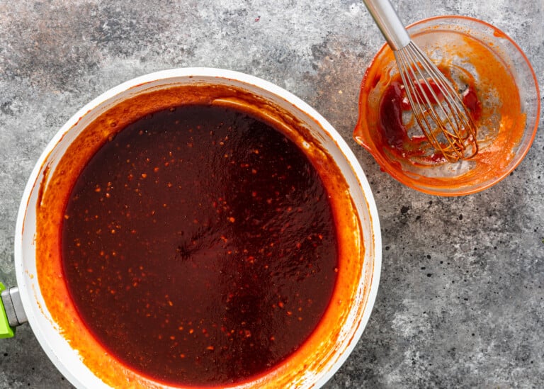 overhead: gochujang sauce inside plastic container