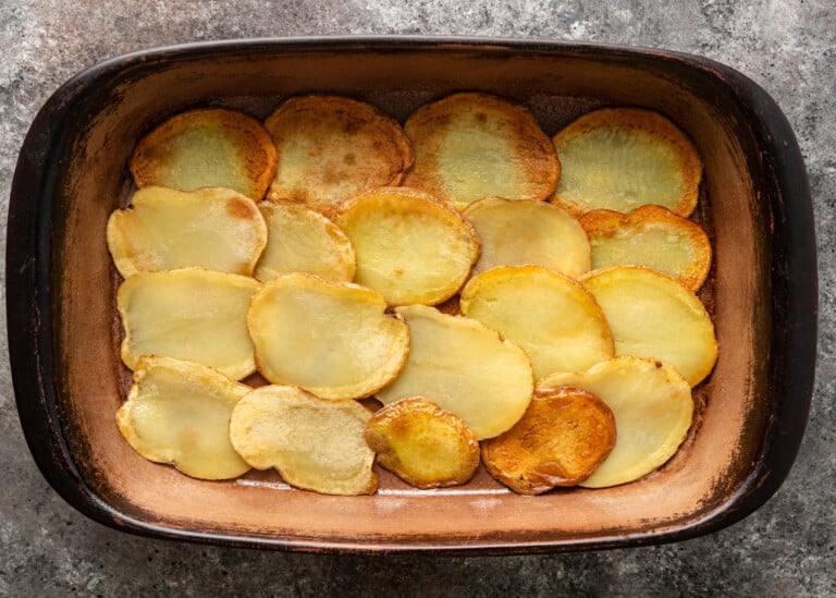 slices of potatoes in dish