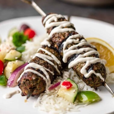 close up image of Moroccan kefta ground beef kabobs