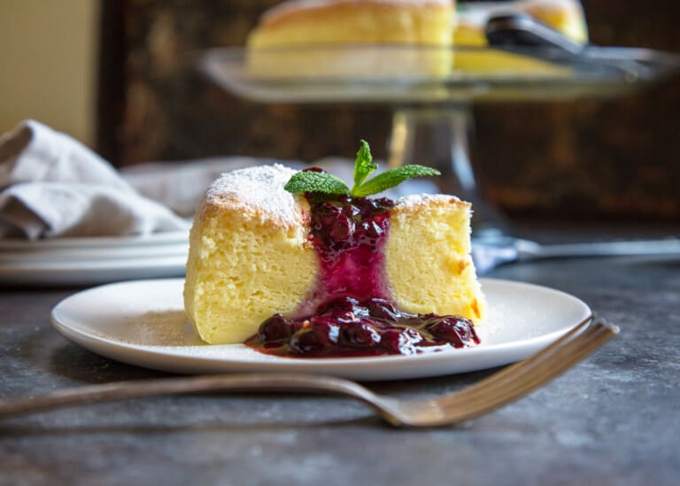 Japanese jiggly cheesecake with berry topping on a plate