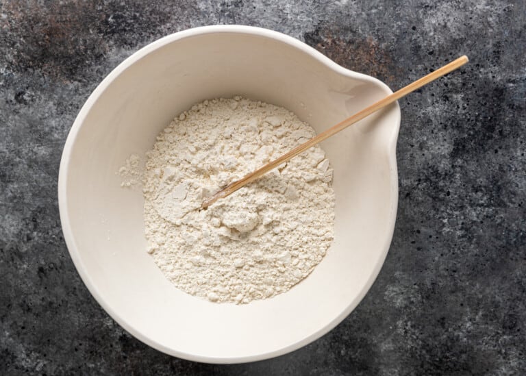 mixing flour and salt in a bowl