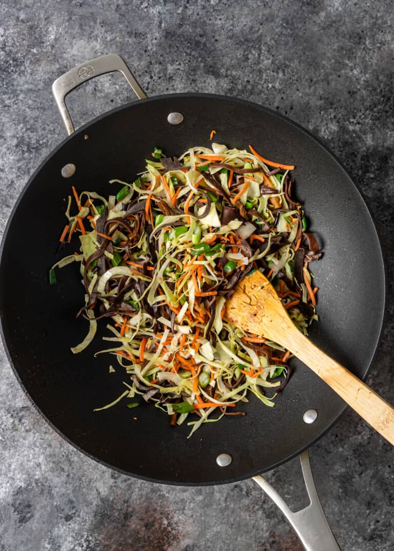stir fried vegetables in wok