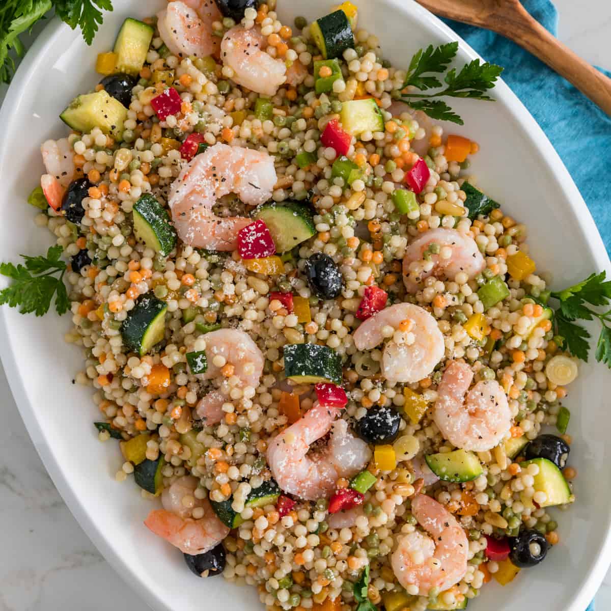 Mediterranean Couscous Salad with Shrimp in a serving bowl