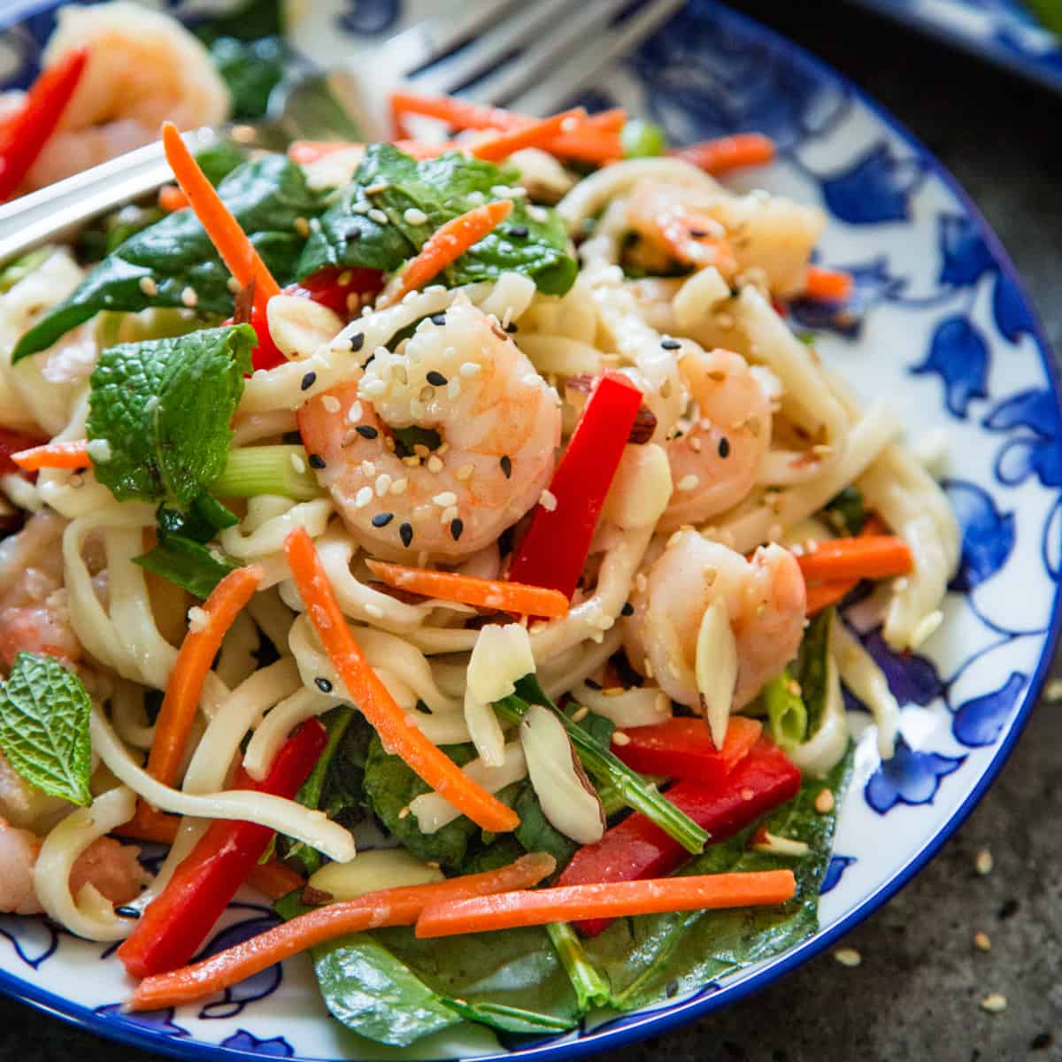 Shrimp Ramen Salad on a blue and white plate