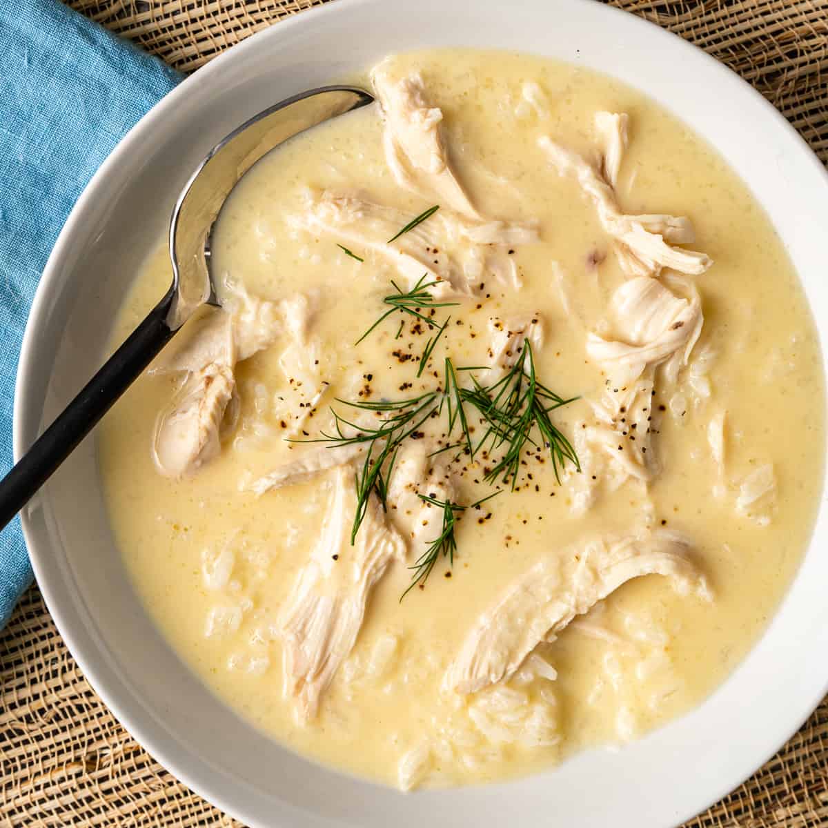 overhead: bowl of avgolemono soup with chicken showing
