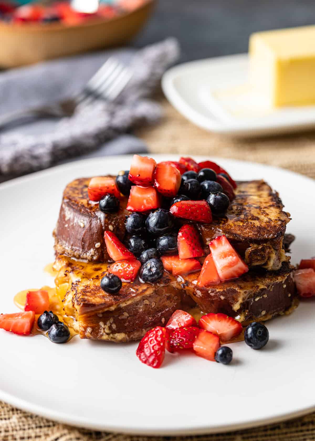 Challah French Toast with syrup and fruit