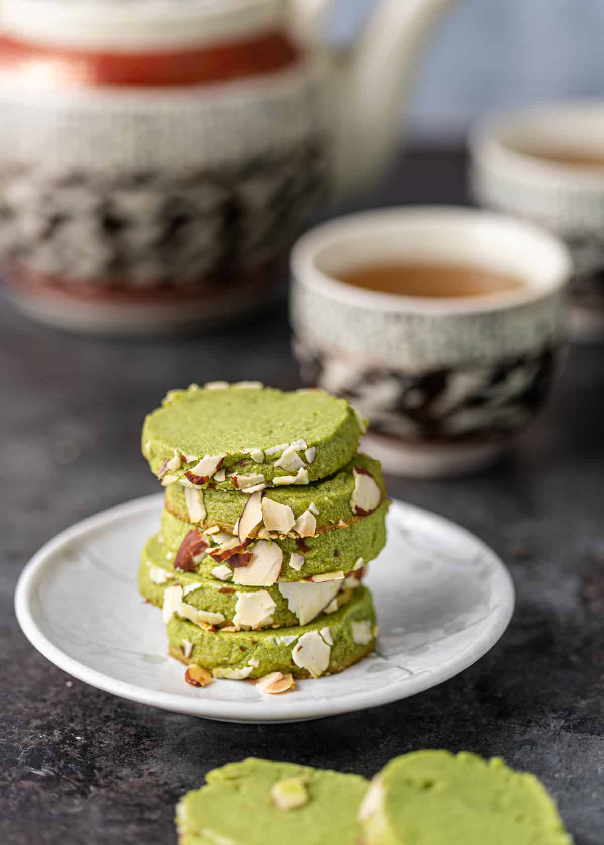stack of matcha cookies on a plate