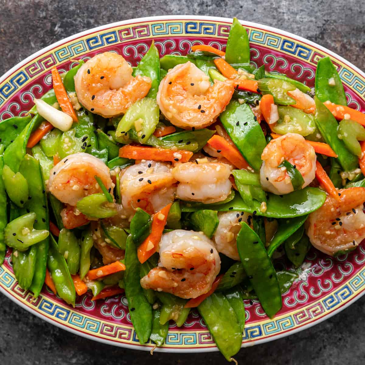 plate with shrimp and snow peas