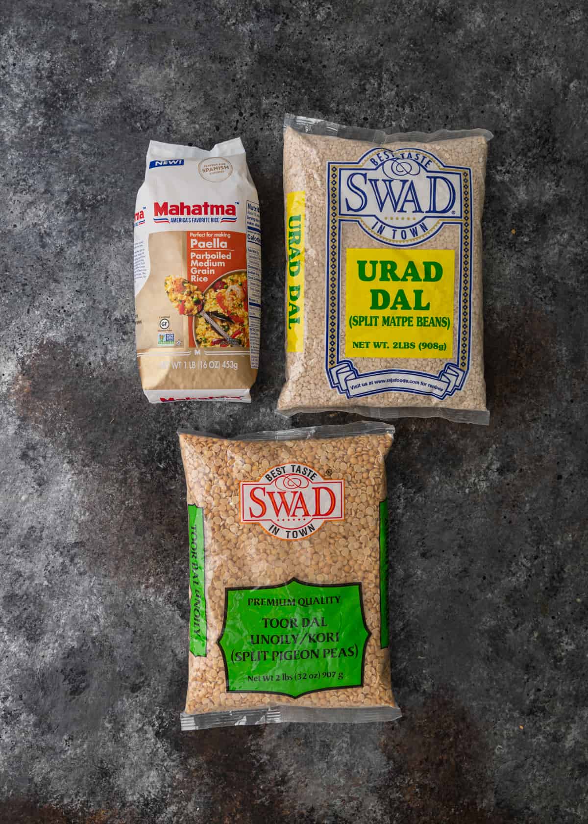 overhead: packages of urad dal, split pigeon peas and paella rice
