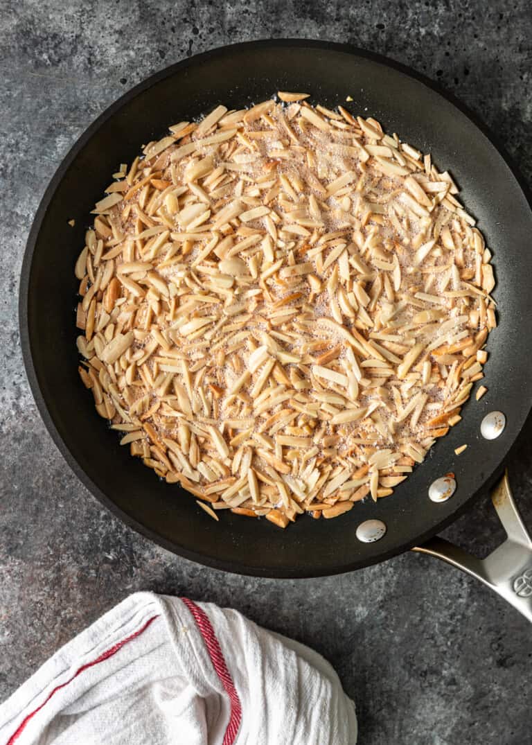 frying almonds in pan