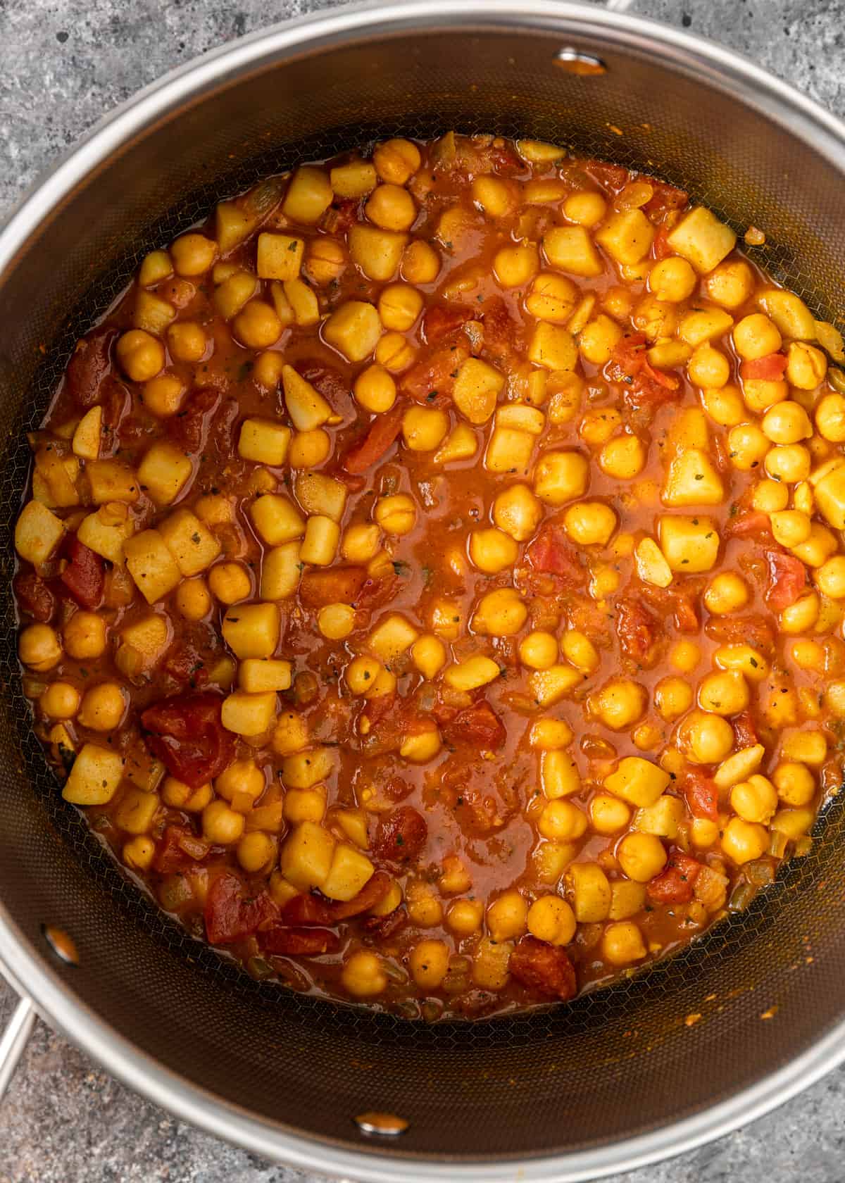 overhead view of a pot of chickpea curry