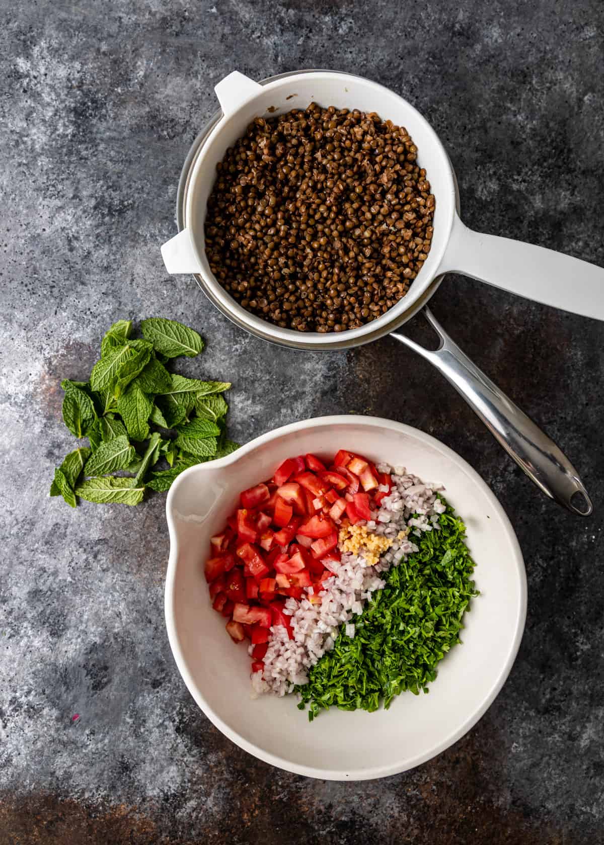 overhead: ingredients needed for lentil tabouli salad