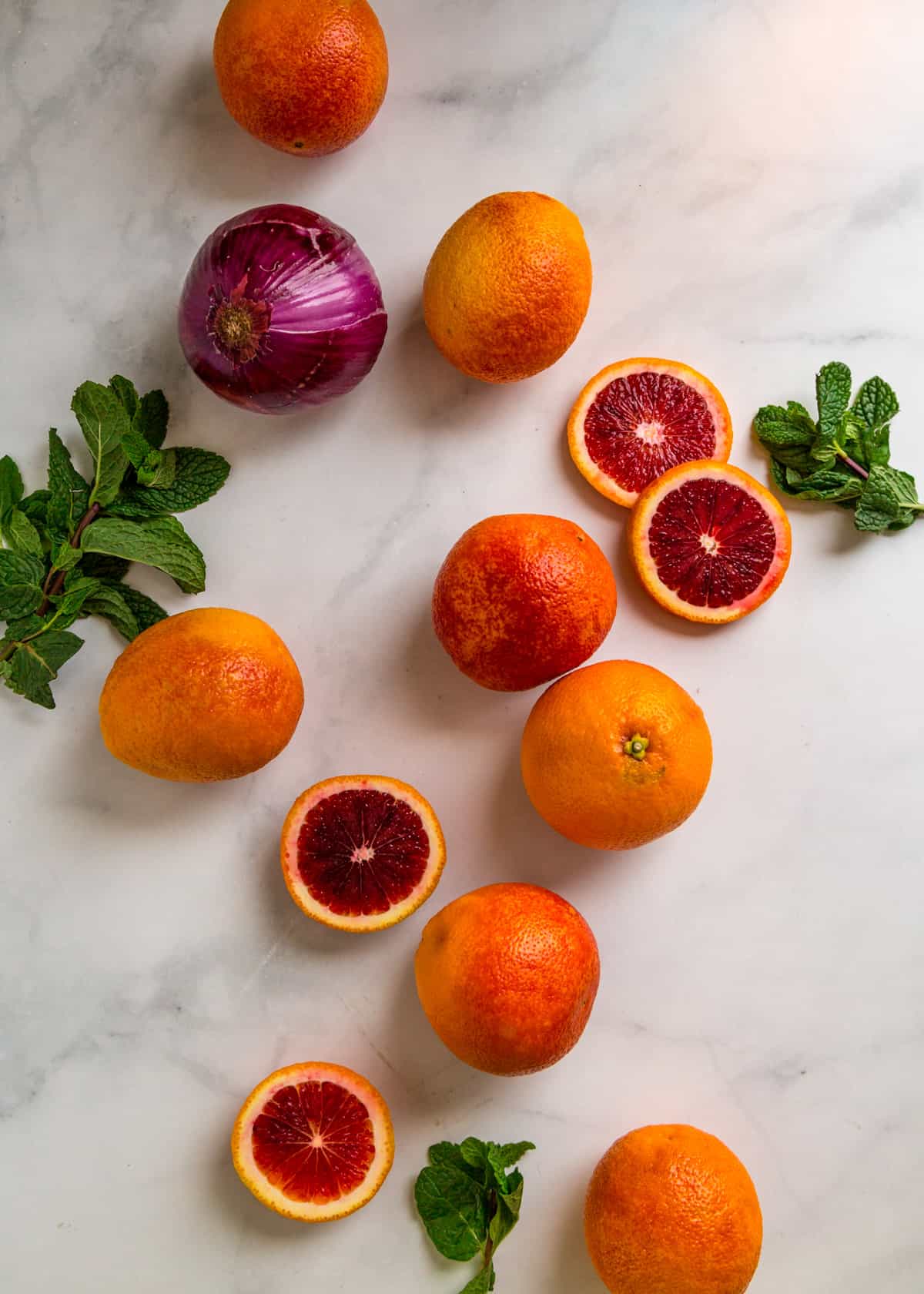 overhead: blood oranges, onion, and mint for blood orange salad