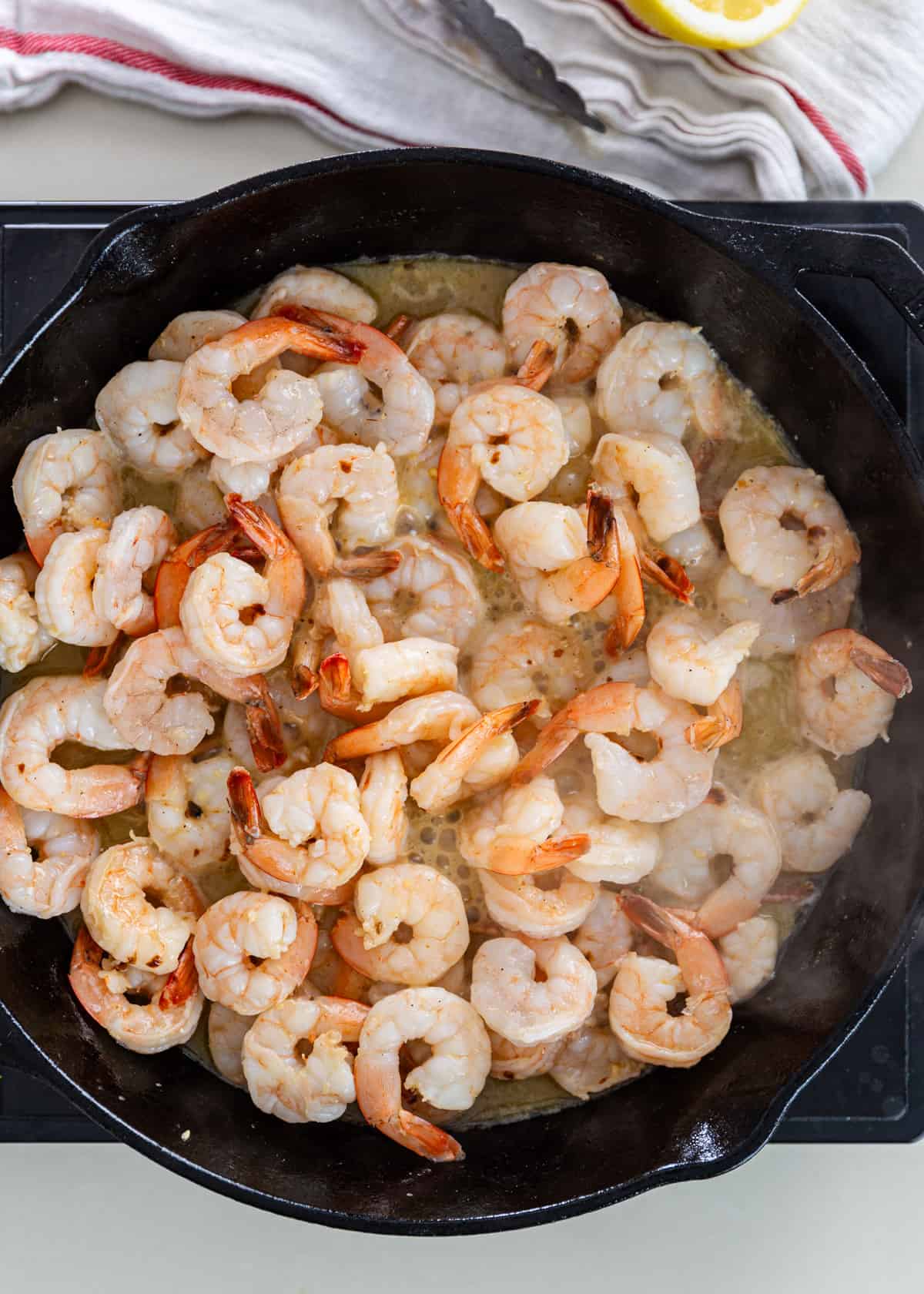overhead: cooked shrimp for shrimp scampi pasta